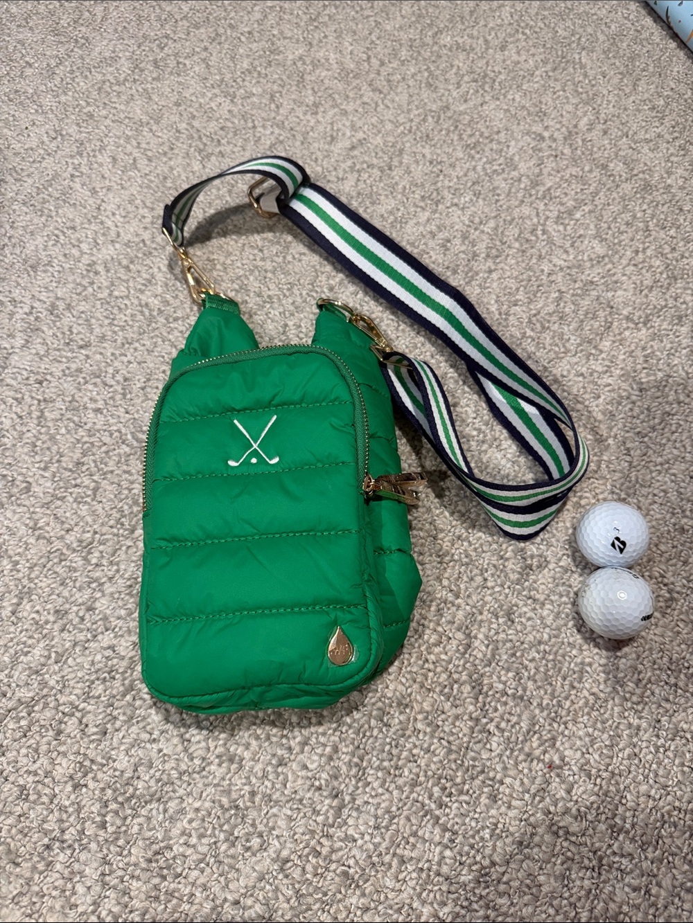 Green Quilted Crossbody Bag with Striped Strap